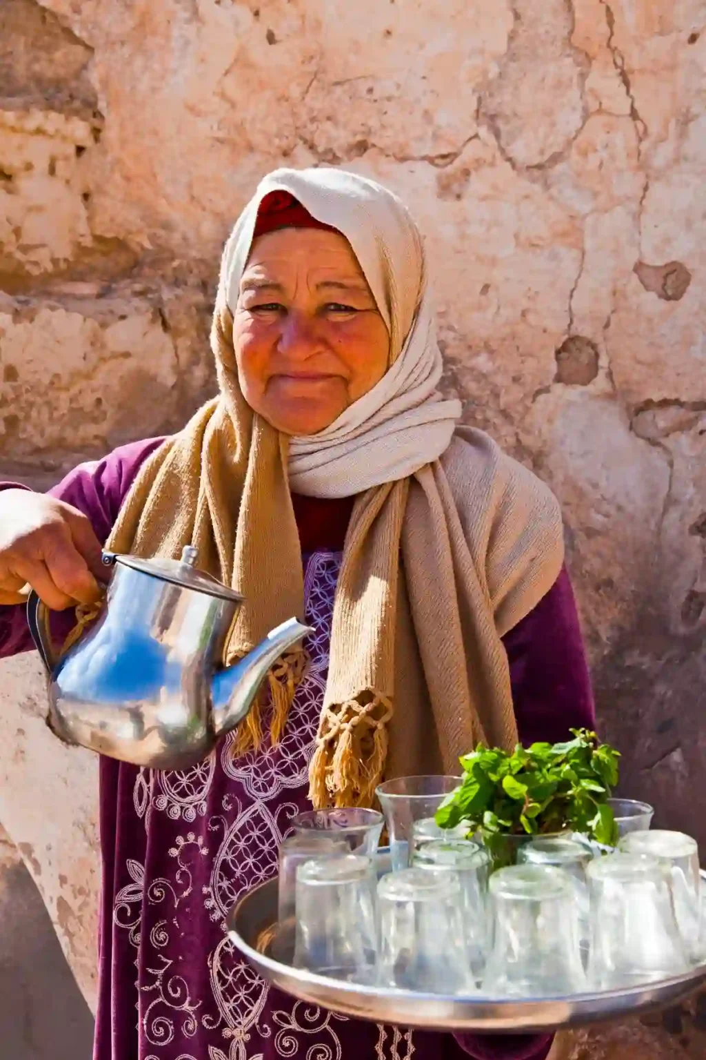 Rural family offering homestay to riders during Morocco MTB tour