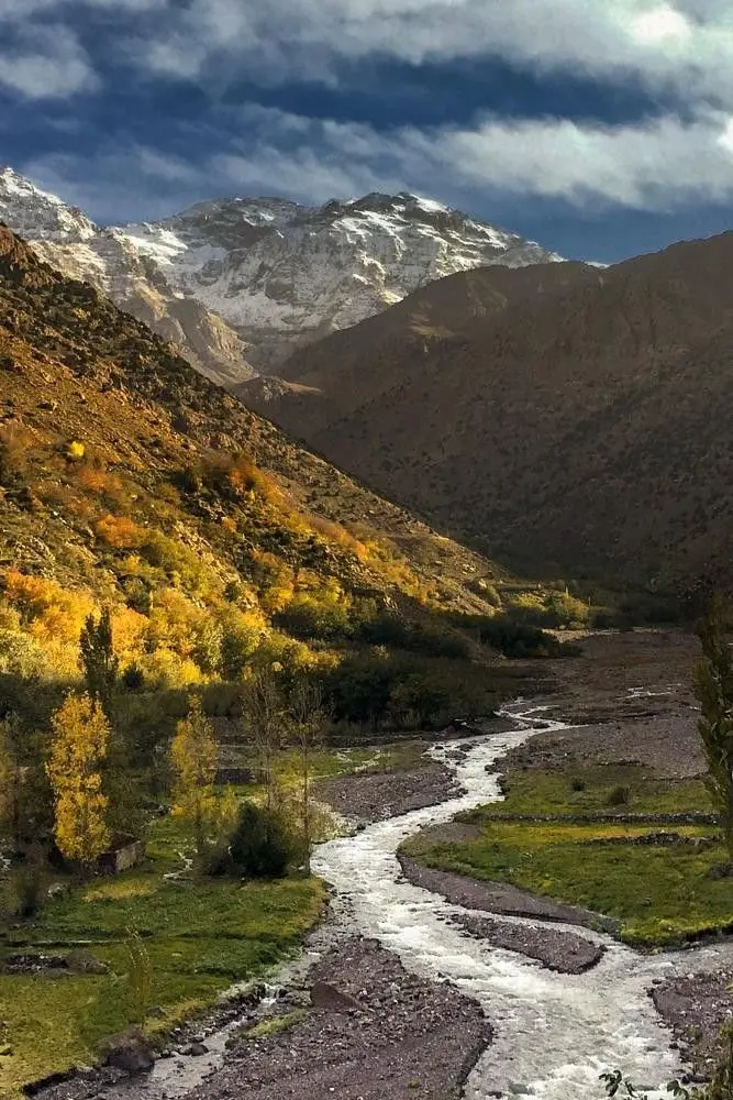 MTB riders exploring the trails and Berber villages around Imlil during the Raid MTB High Atlas